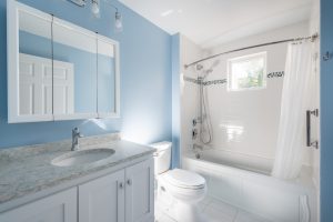 bathroom remodel with blue walls