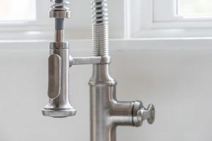 close up of kitchen faucet