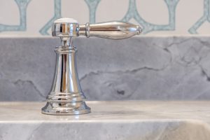 close up on bathroom sink handle