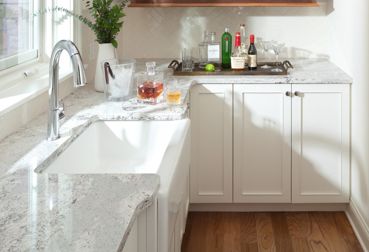 stunning countertops and white cabinets