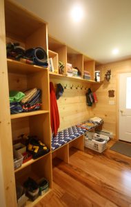 wood built shelf and bench storage for shoes and kids