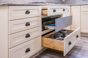 kitchen drawers pulled out showing the different types of storage features