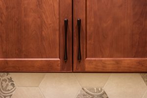 close up of wooden cabinets in kitchen