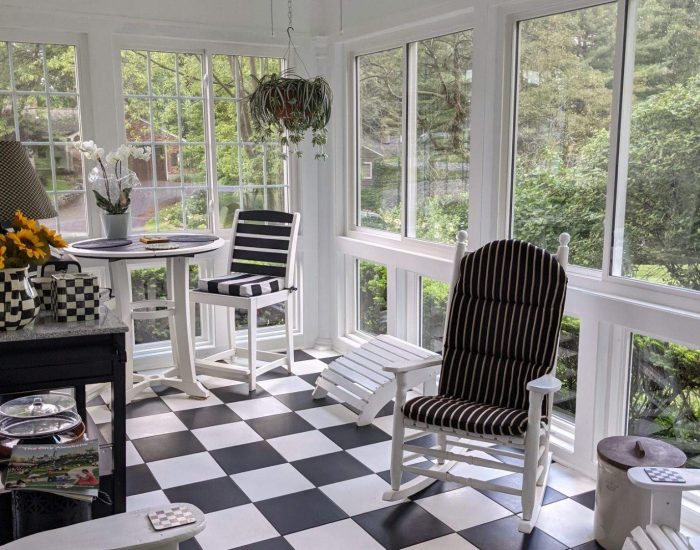 sun room with black and white checkered flooring