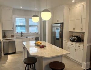 beautiful new kitchen remodel in albany ny with white countertops and cabinets