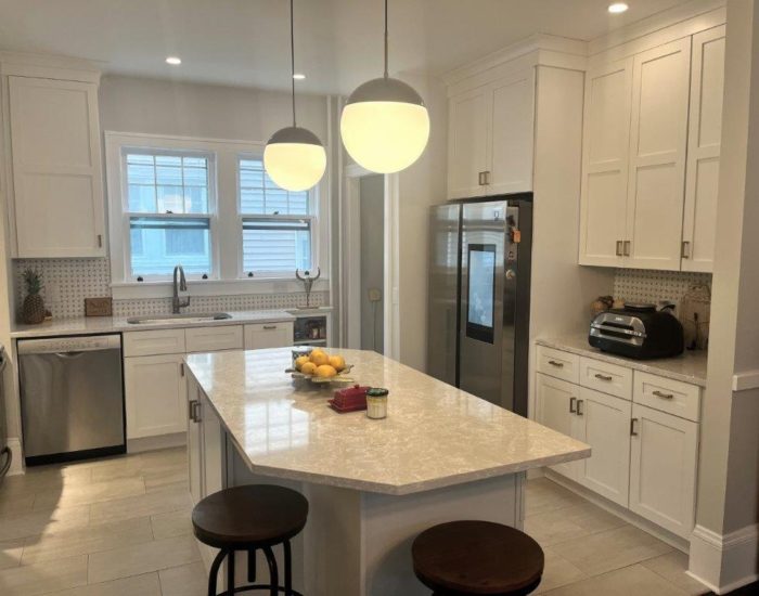 beautiful new kitchen remodel in albany ny with white countertops and cabinets